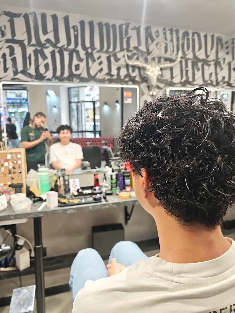 Corte de rizos definidos en cliente de Club 13
